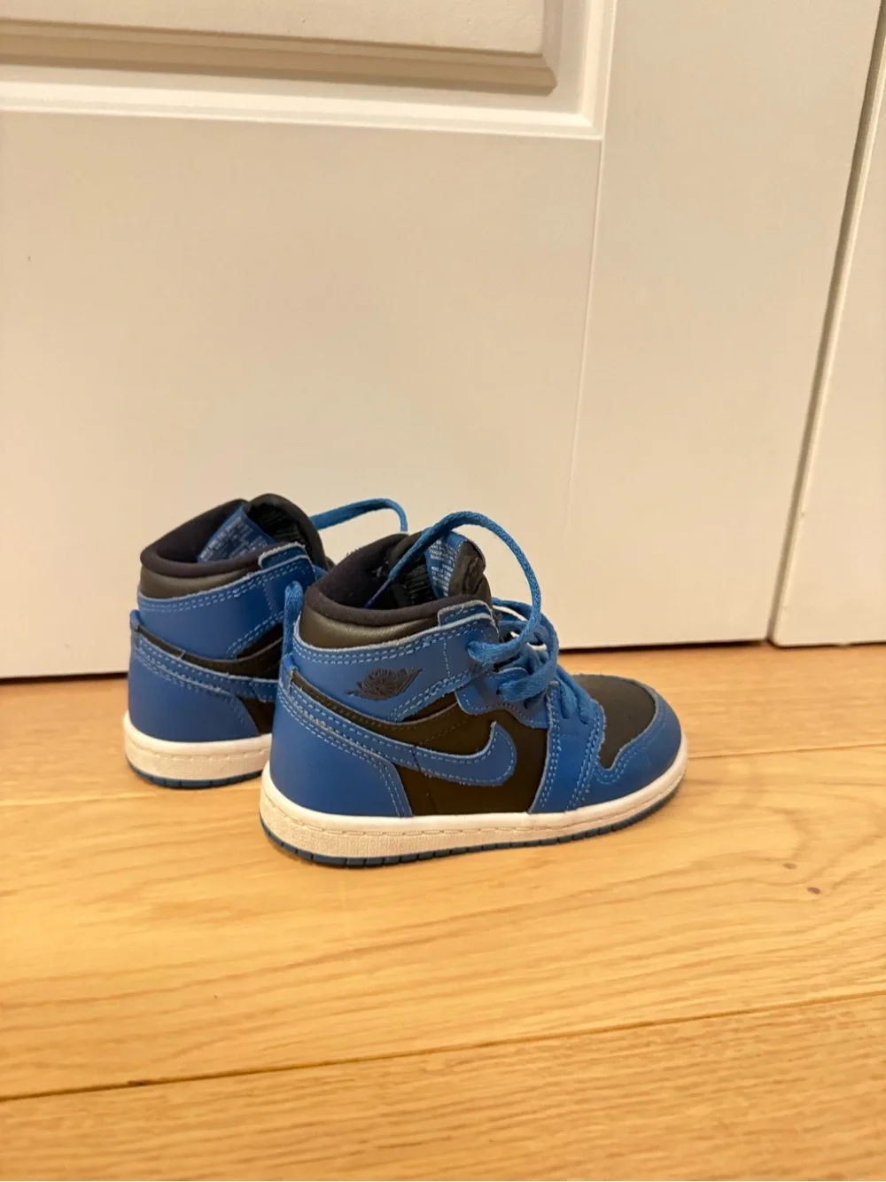 Kids High-Top Nike Sneakers in Blue and Black